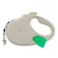 TUG Oval 360° Tangle-Free Retractable Dog Leash with Integrated Waste Bag Dispenser (Small, Cream)